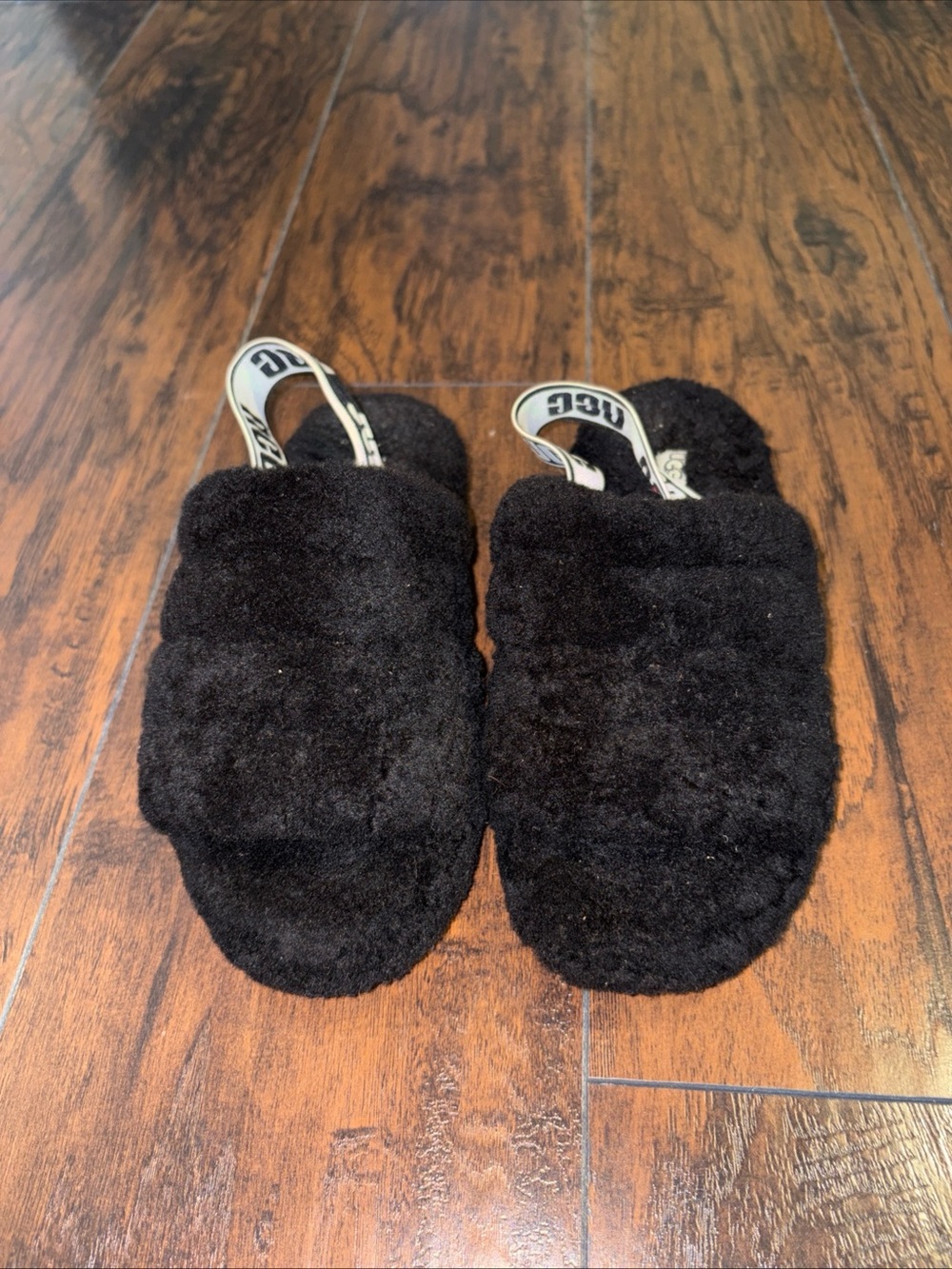 UGG Black Plush Shearling Slide Sandals with Branded Heel Strap